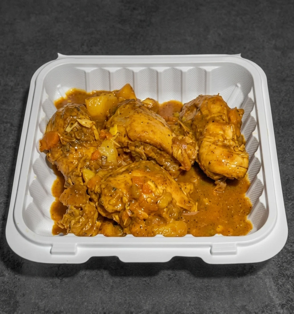Curry chicken and rice at Twin Dem Kitchen Caribbean restaurant London Ontario